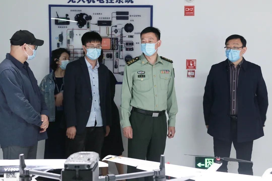 温州军分区政治部主任谷常辉一行来校调